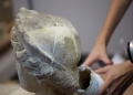 Cleaning the marble head of Nemesis using laser.