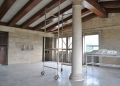Scaffolding used to clean the wood ceiling beams.