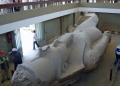 The group looks at the statue of Ramses II at Memphis.