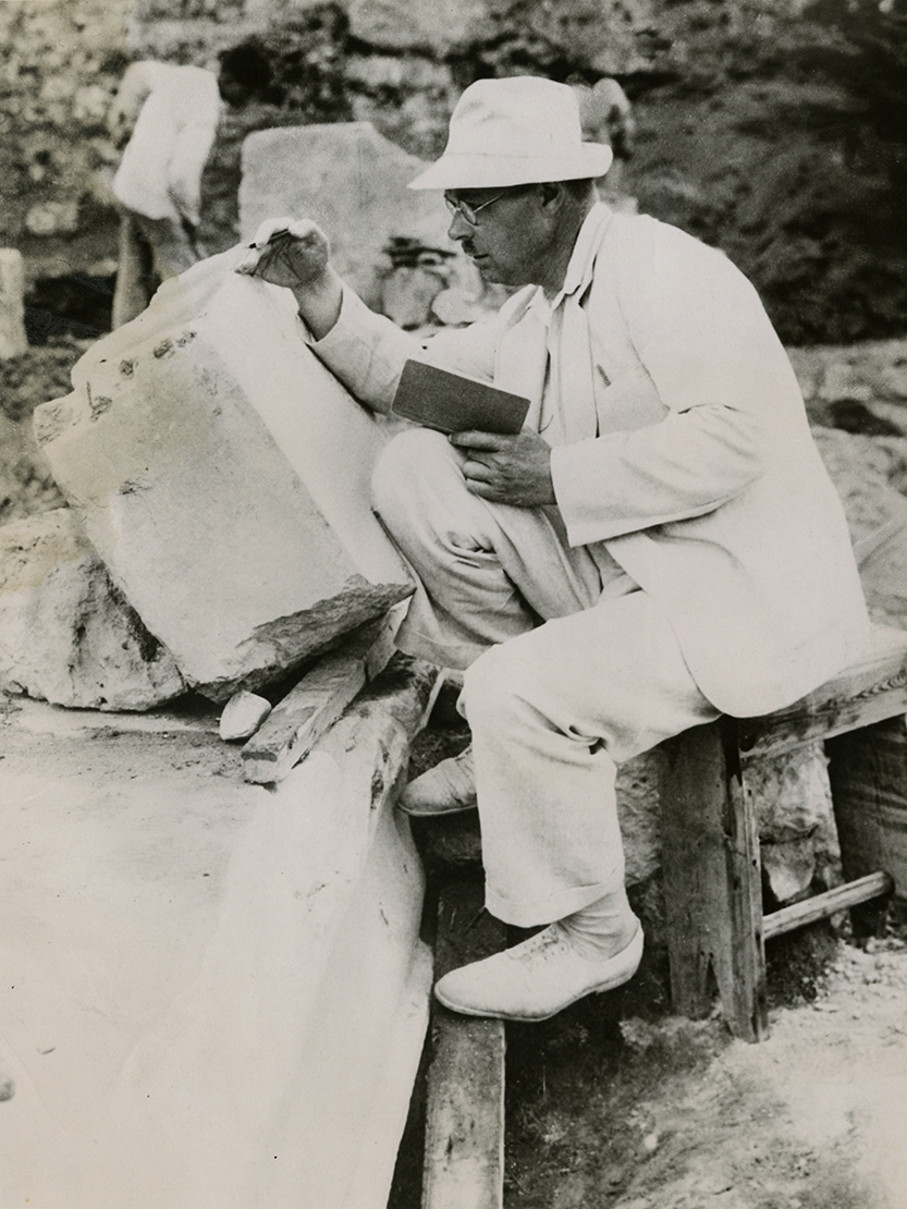 Oscar Broneer Studies an Inscription, ca. 1938