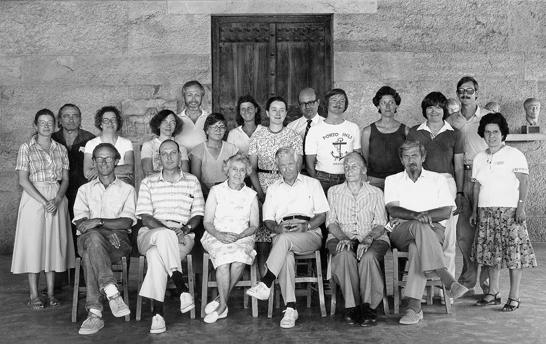 Virginia Grace (seated, second from right) with the Agora Excavations staff and visiting scholars in 1980. Standing (left to right): Leslie Mechem, Spyros Spyropoulos, Sally Roberts, Susan Rotroff, Robert Pounder, Lynn Grant, Helen Townsend, Mary Moore, Malcolm Wallace, Steve Koob, Alison Adams, Margie Miles, Robert Vincent, Kyriaki Moustaki. Sitting: John Camp, T. Leslie Shear Jr., Dorothy Thompson, Homer Thompson, Virginia Grace, Bill Dinsmoor Jr.