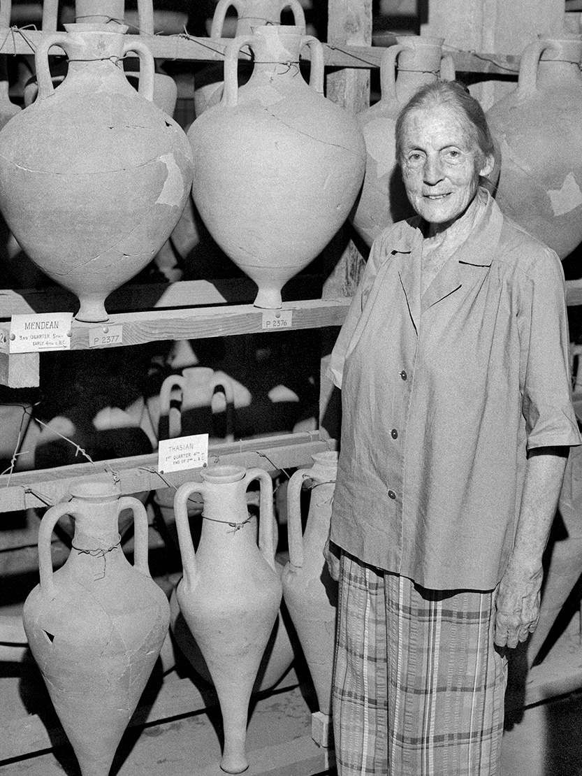 Virginia Grace in the Agora’s amphora storage room (basement of the Stoa of Attalos) in 1976 with racks that she designed when the Stoa was rebuilt in the 1950s